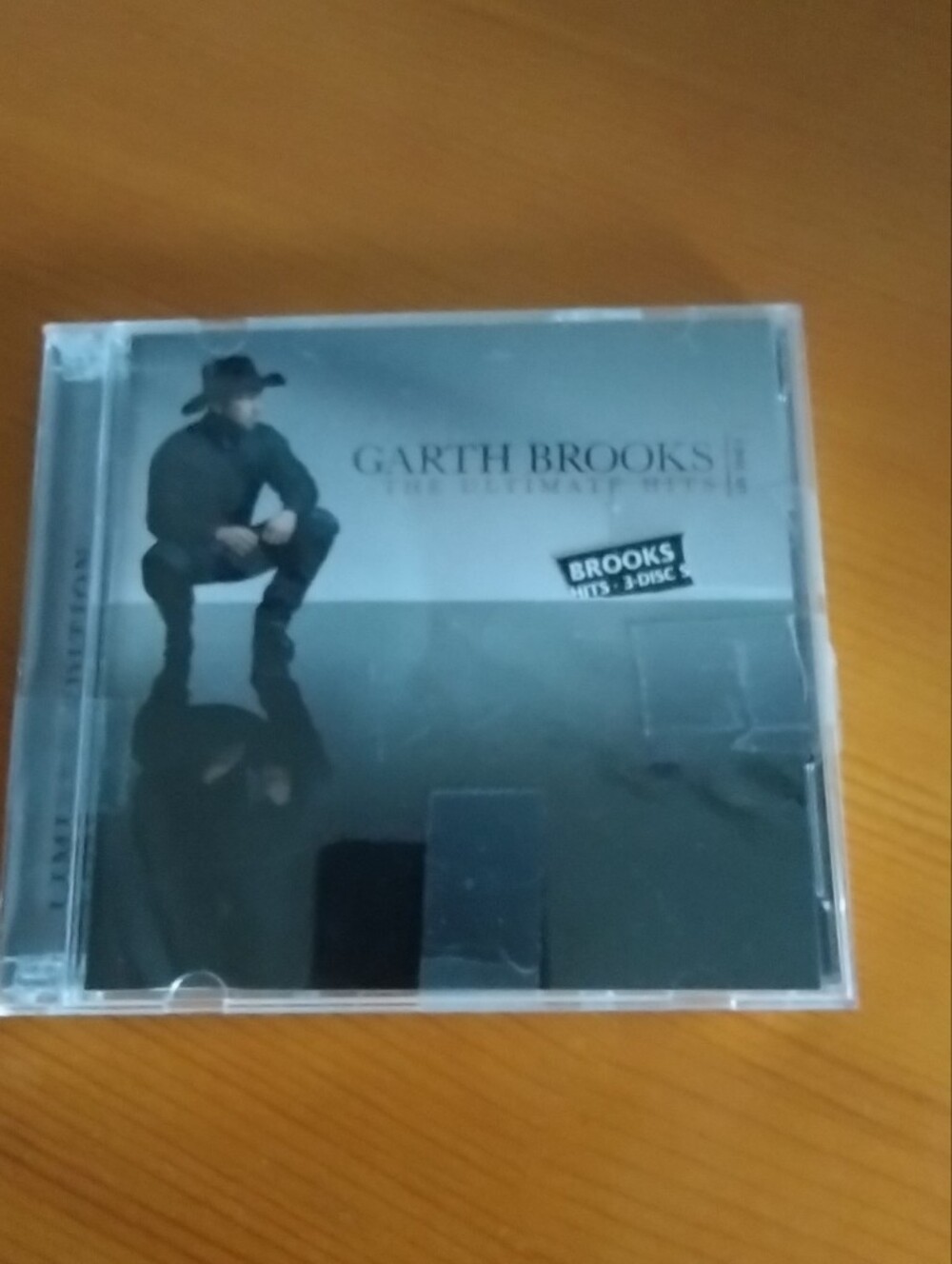 Garth Brooks - The Ultimate Hits (CD) - Black & Gray Cover